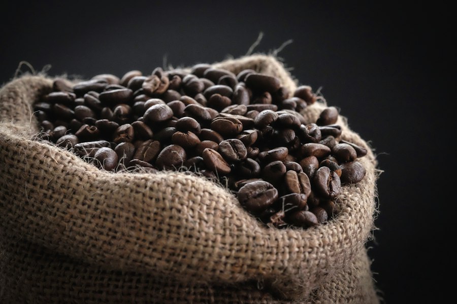 Roasted coffee beans in a burlap sack